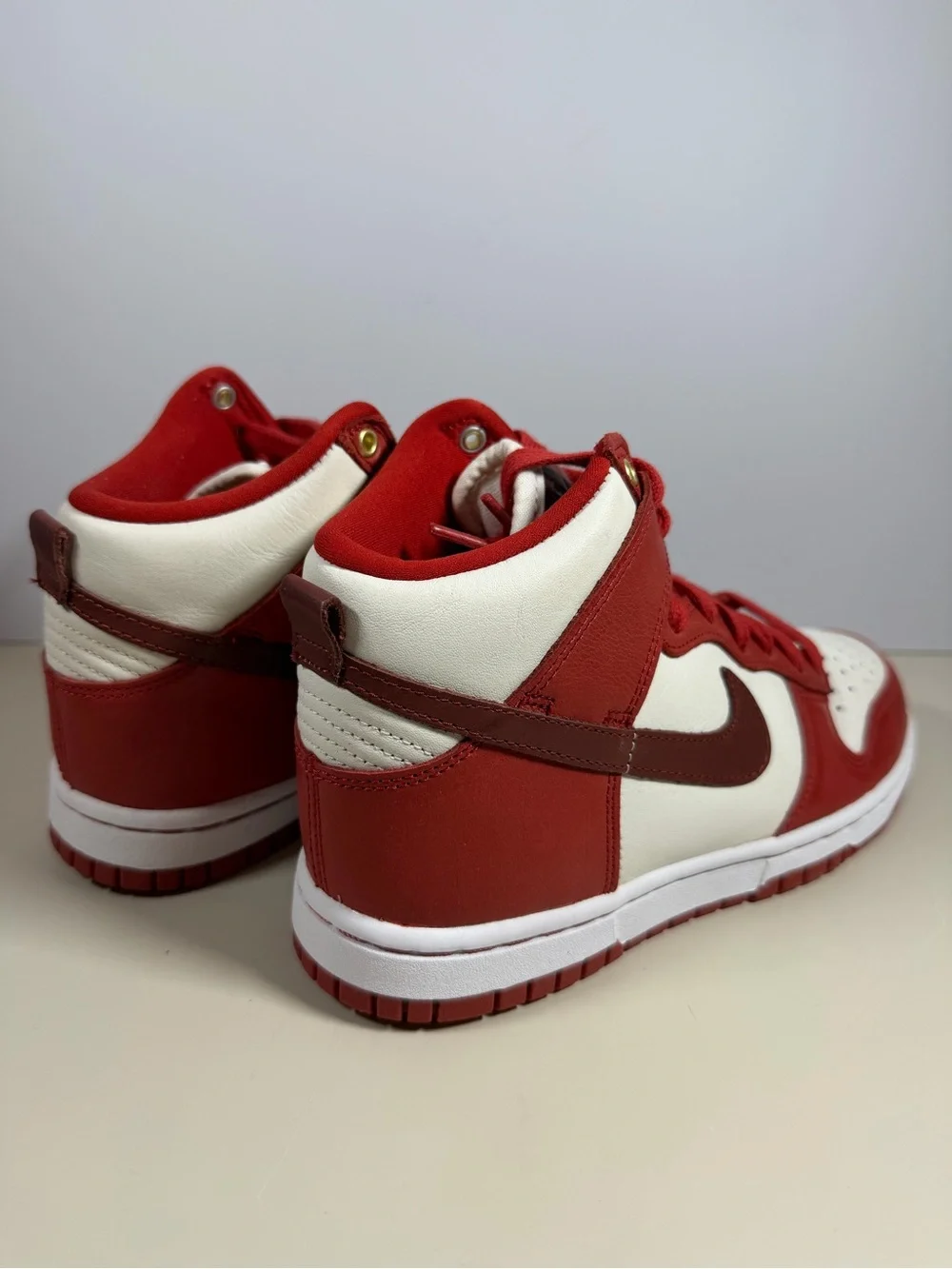 Nike Men’s Red and White High-Top Sneakers with Dark Red Swoosh